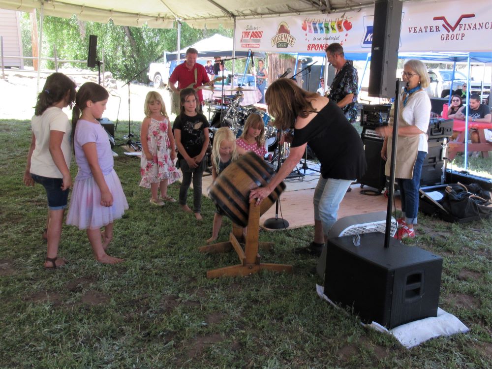 Photo of children who are helping with the 50/50 drawing.