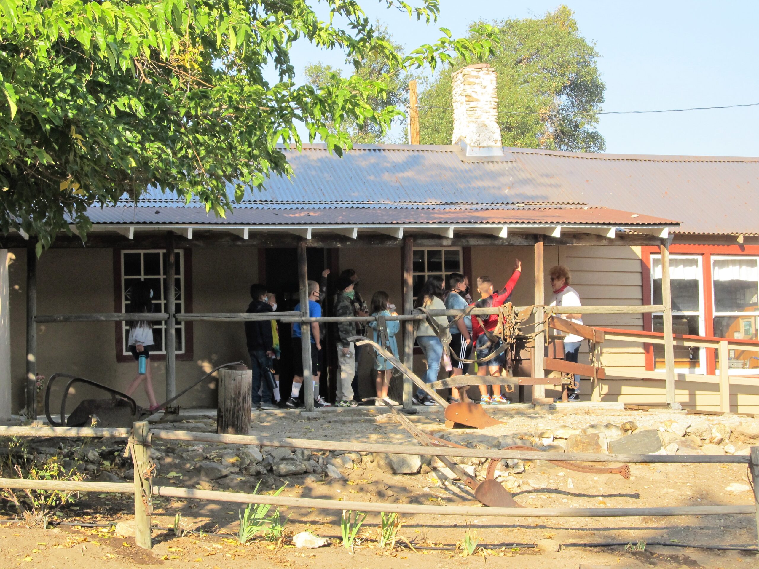 This is a photo of some of the children lined up to see the inside of the Adobe